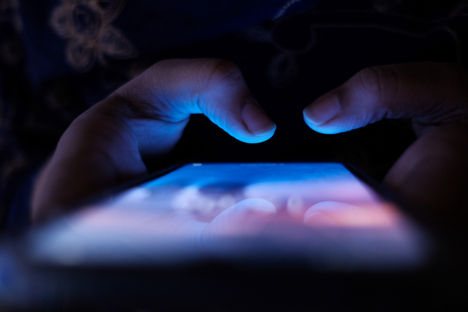 women hand with smart phone using siclal media app