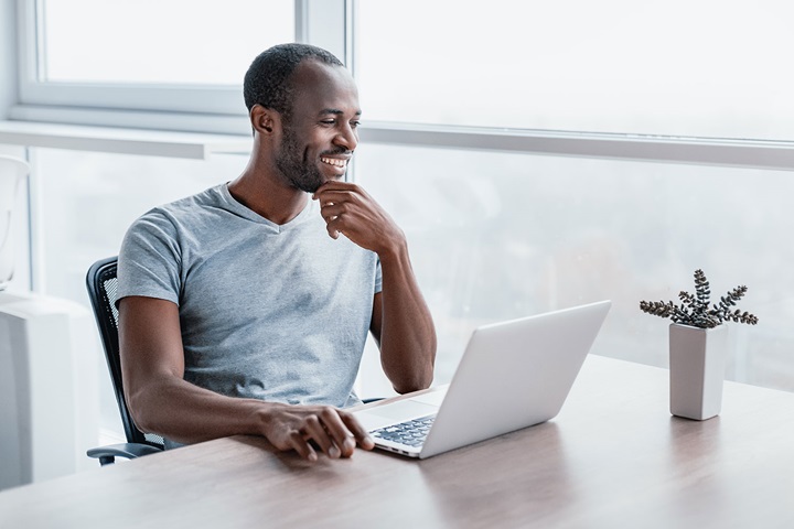 Man looking at laptop
