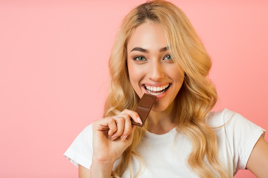Woman eating Chocolate